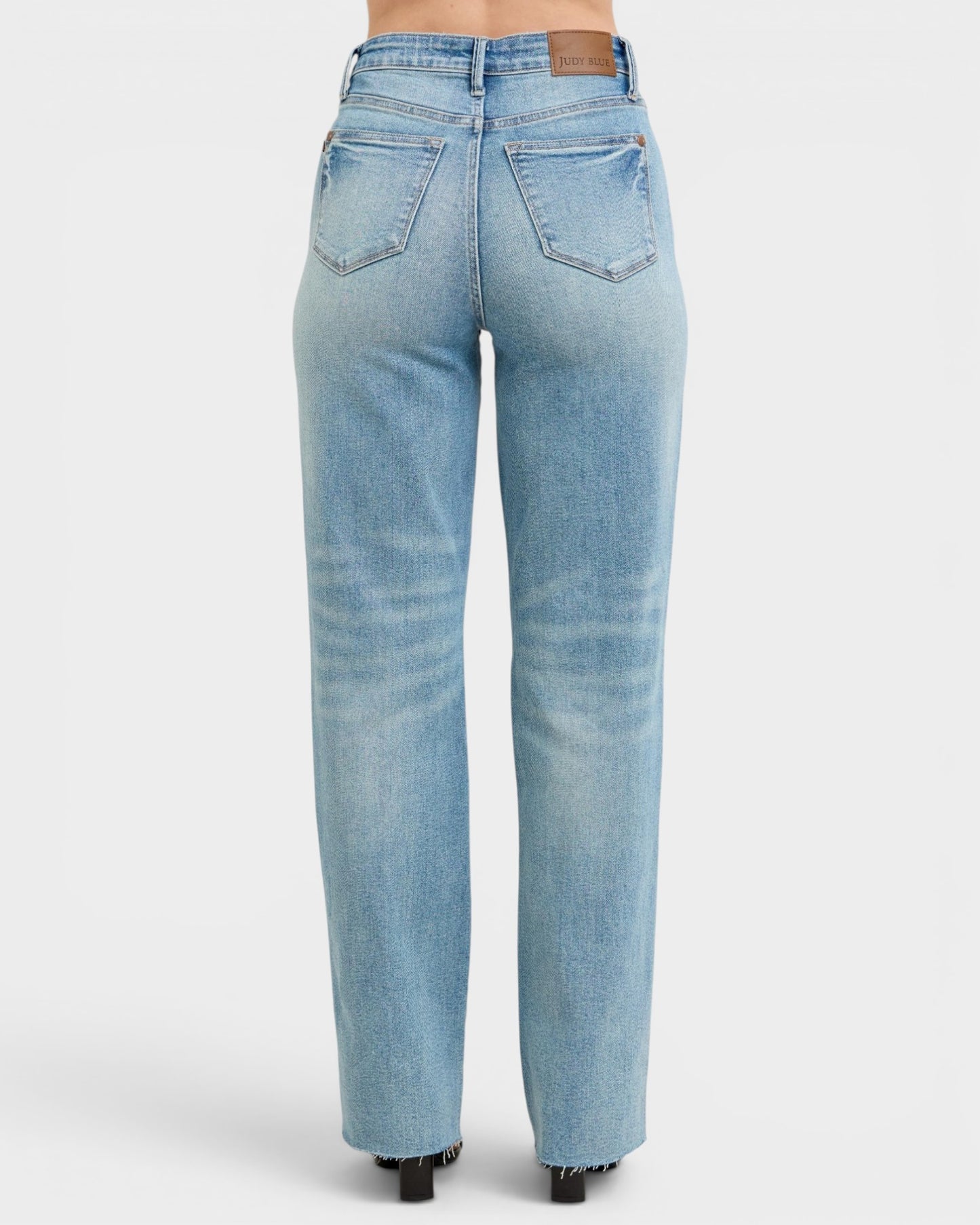 Light blue jeans on a white background