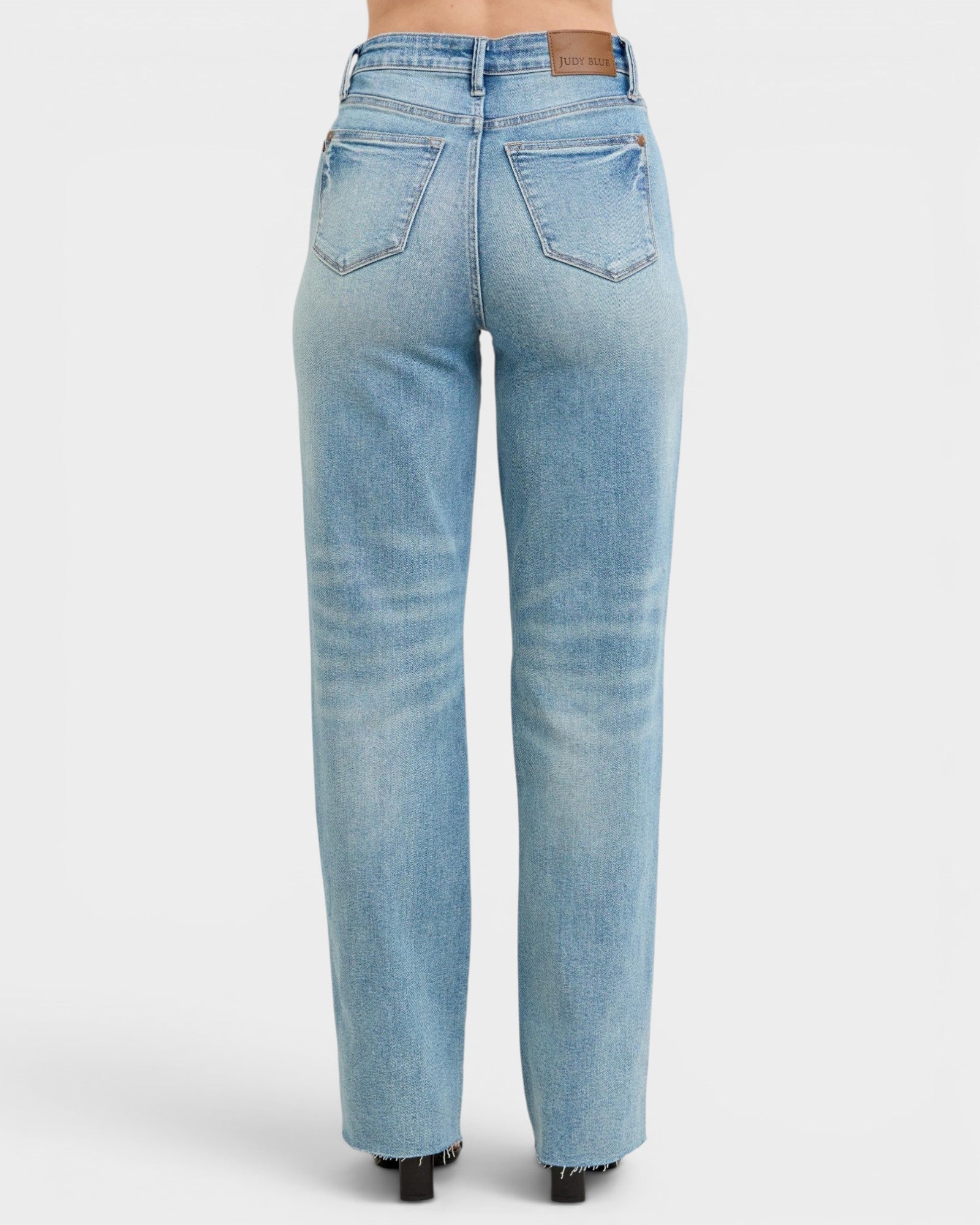 Light blue jeans on a white background