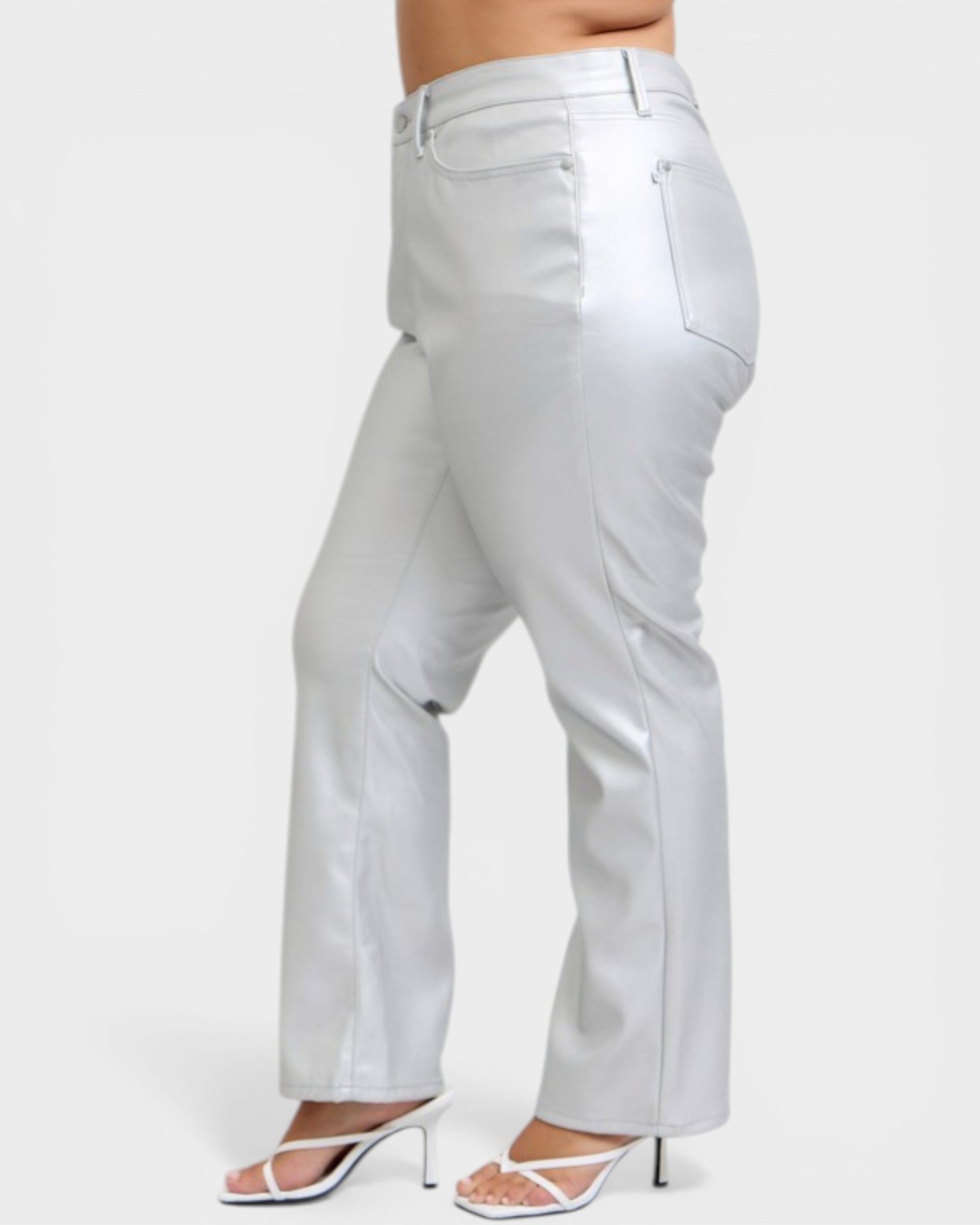 Light gray pants worn by a person on a white background