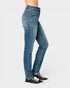 A person wearing medium-wash blue denim jeans and black sneakers, shown from the waist down against a light gray studio background.