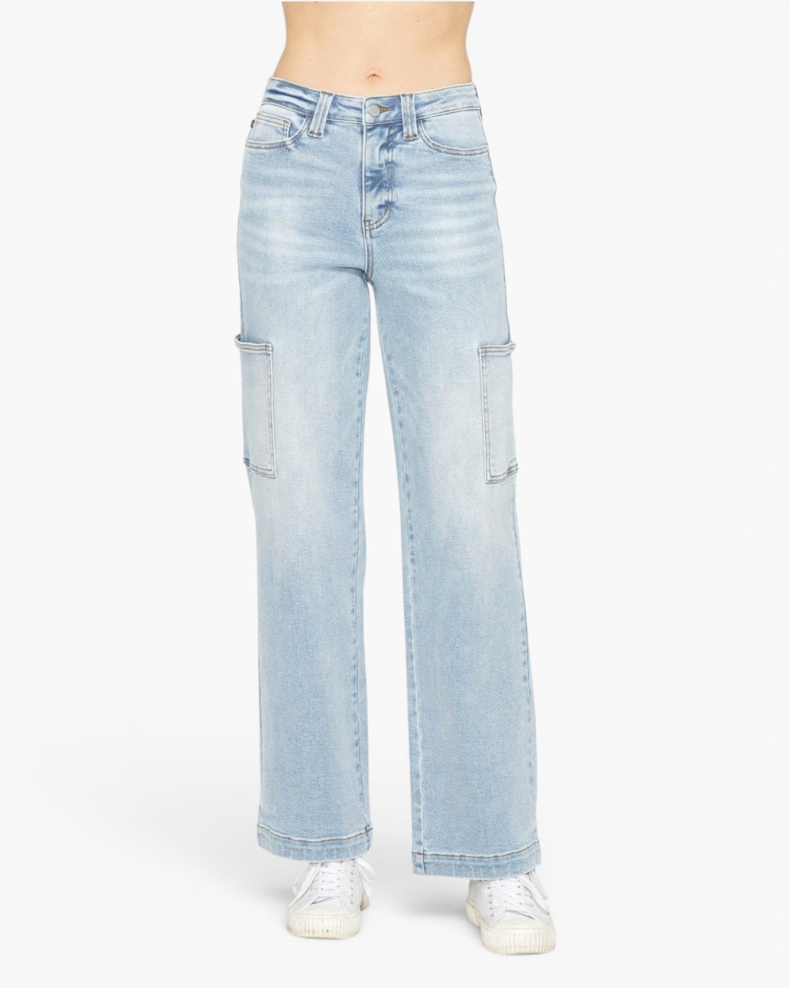 Light wash blue wide-leg jeans with cargo pockets on the outer thighs, shown on a model from the waist down wearing white sneakers against a plain white background.