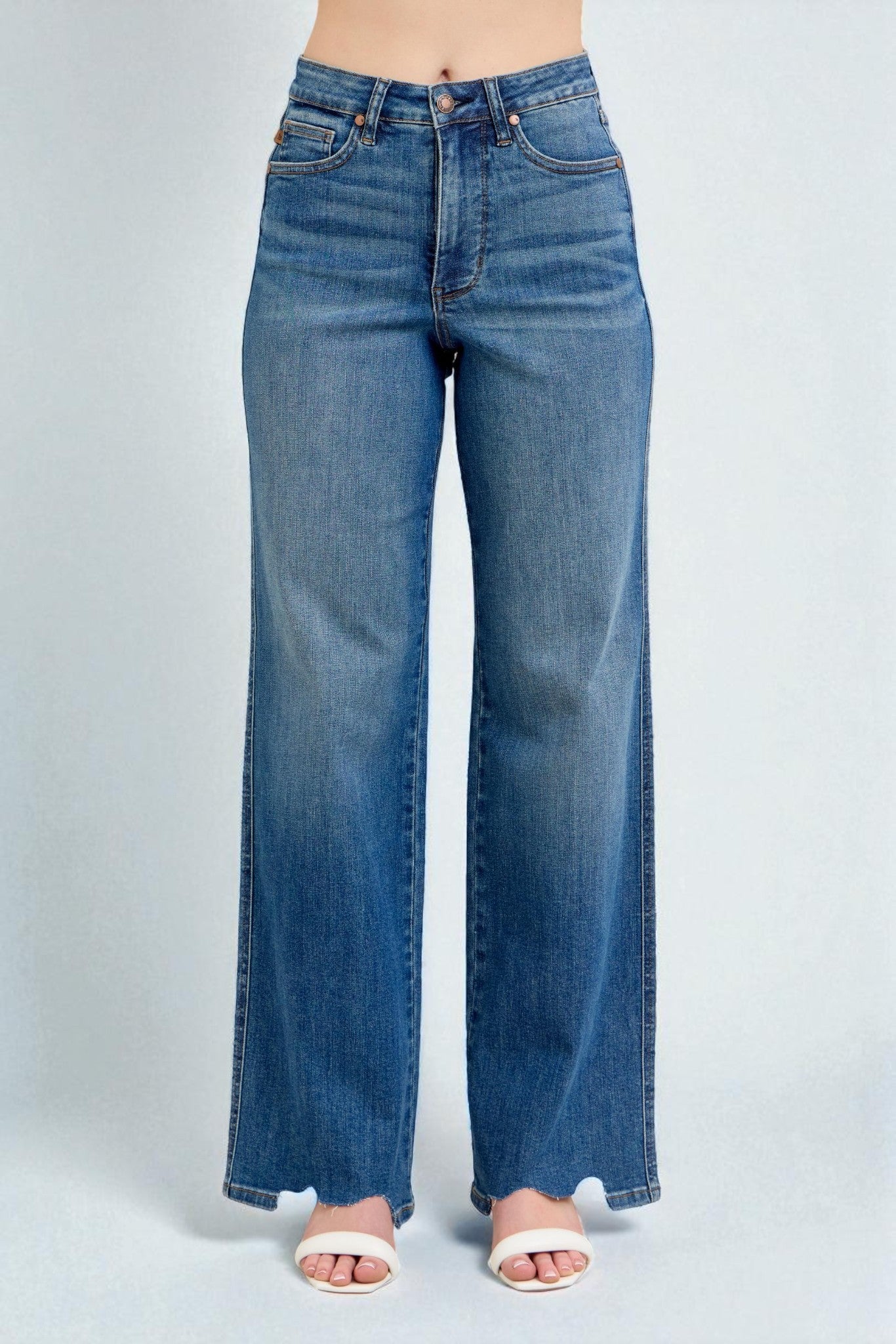 Blue jeans on a plain background