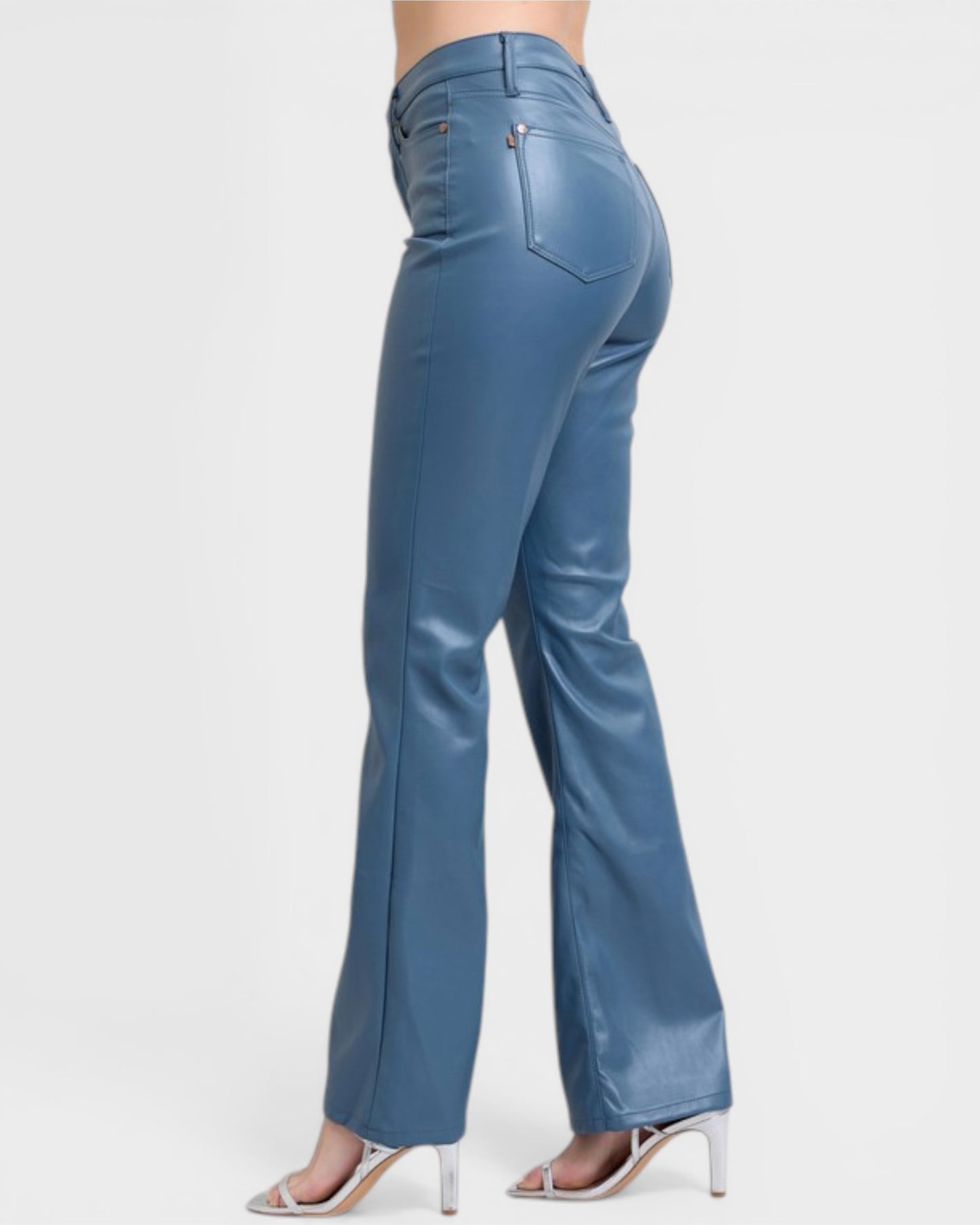 Blue flared pants on a white background