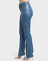 Blue pants worn by a person on a white background