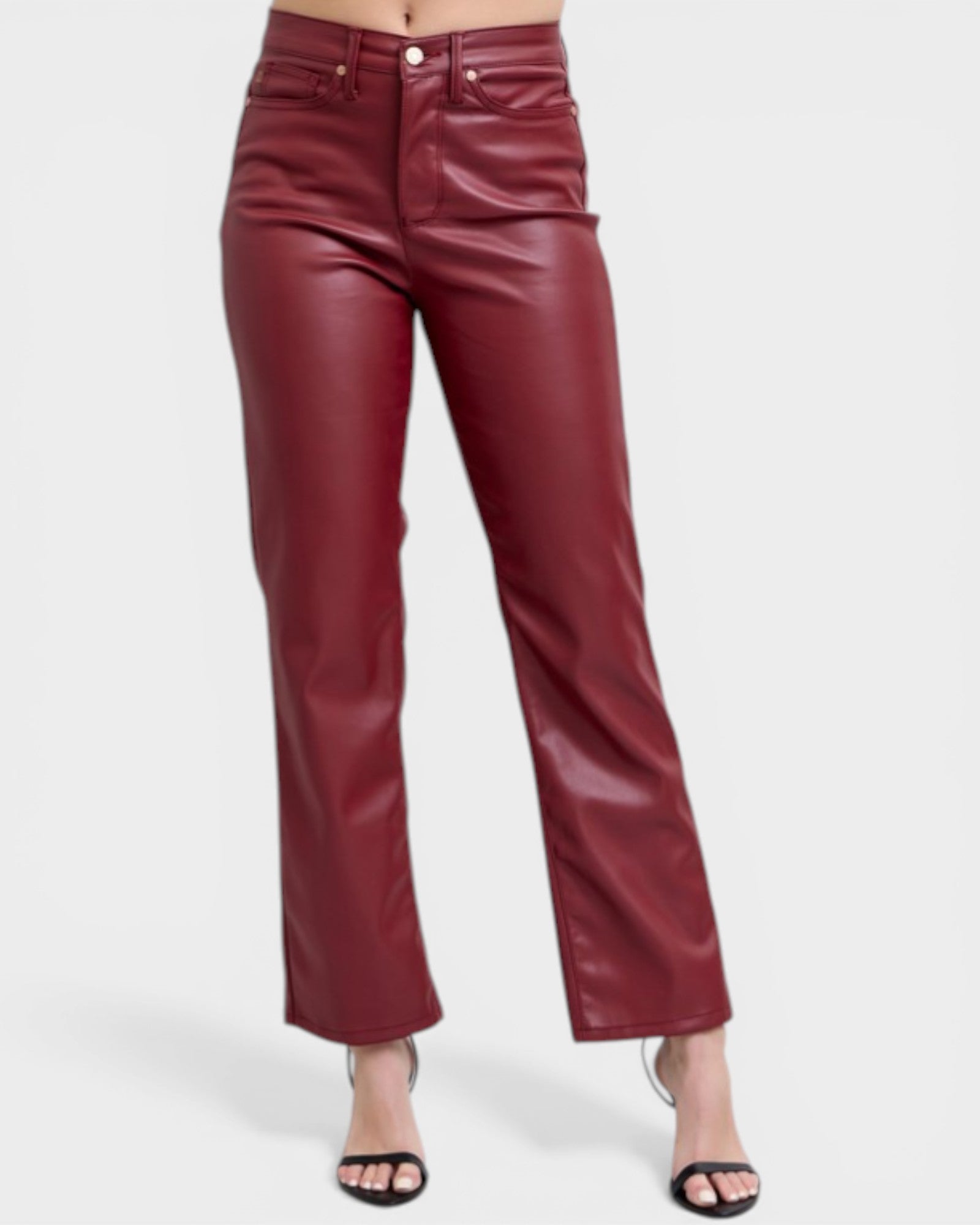 Maroon leather pants on a white background