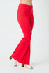 Red flared jeans worn by a person on a white background