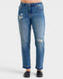 Blue jeans with distressed details on a white background