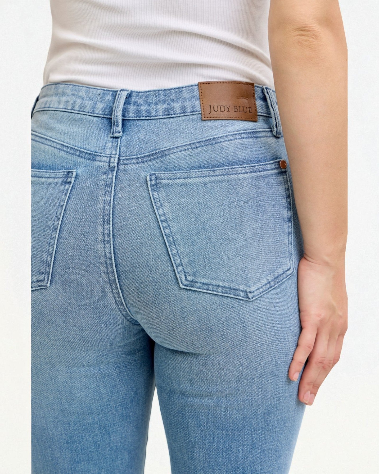 Light blue jeans with a Judy Blue label on a white background
