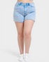 Light blue denim shorts worn by a person on a white background