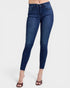Blue jeans worn by a person on a white background
