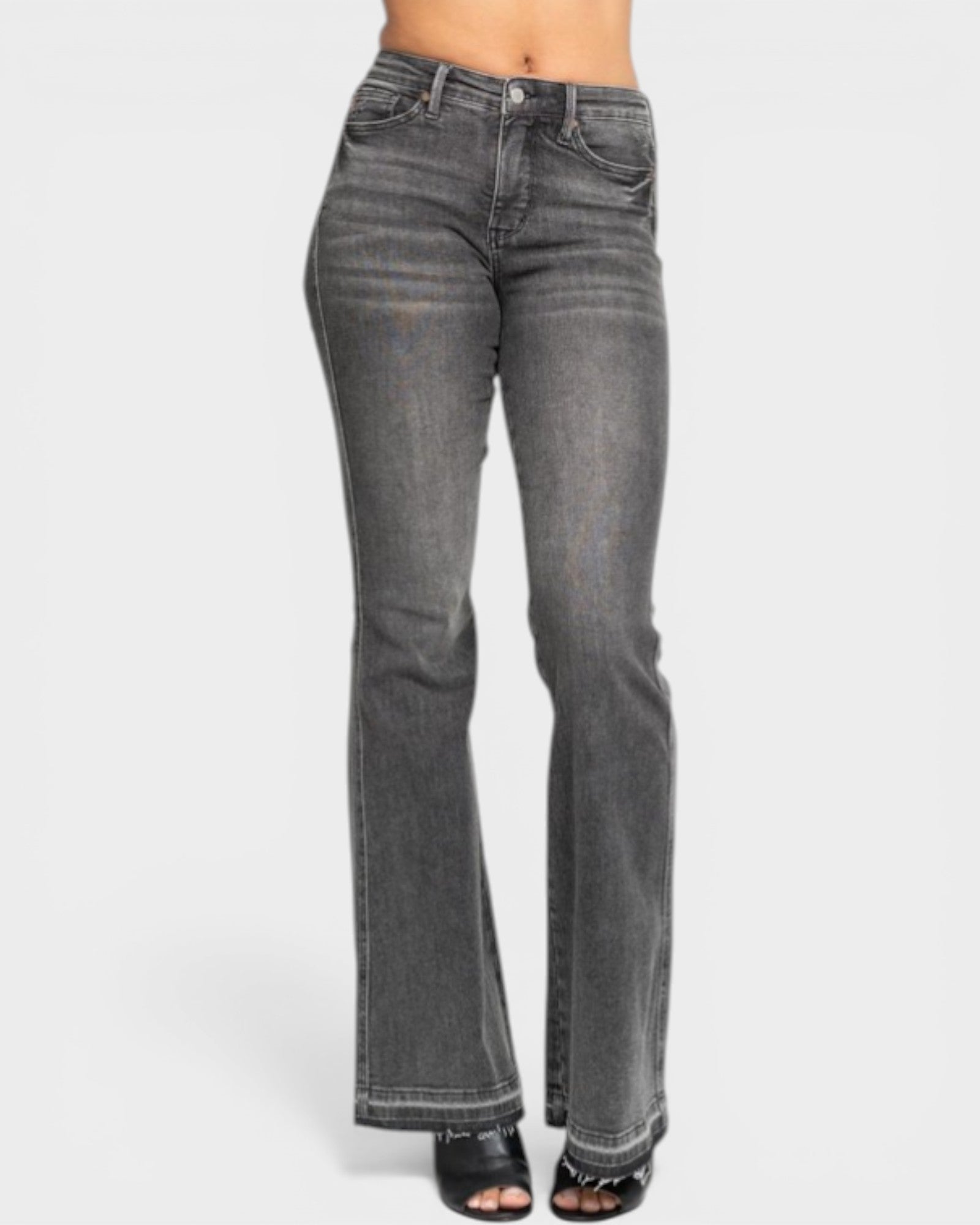 Gray flared jeans on a white background