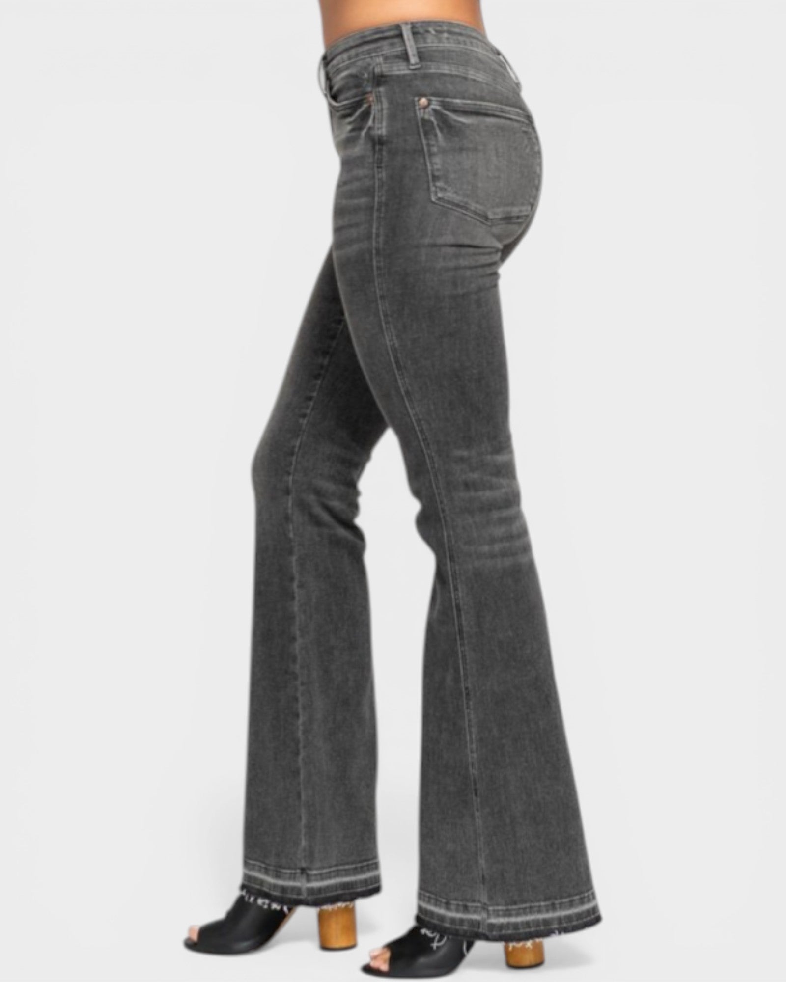 Gray flared jeans on a white background