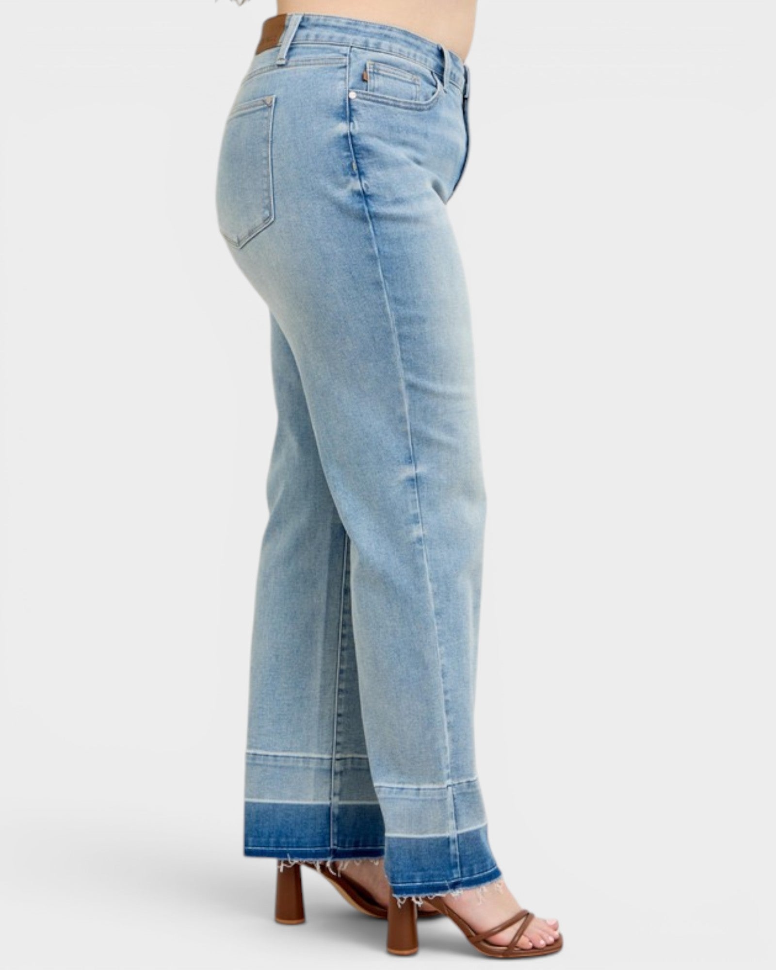 Light blue jeans with a white background