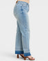 Light blue jeans with a white background