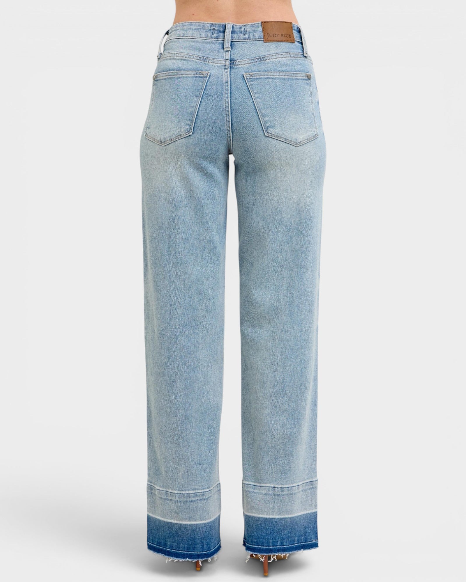 Light blue jeans on a white background