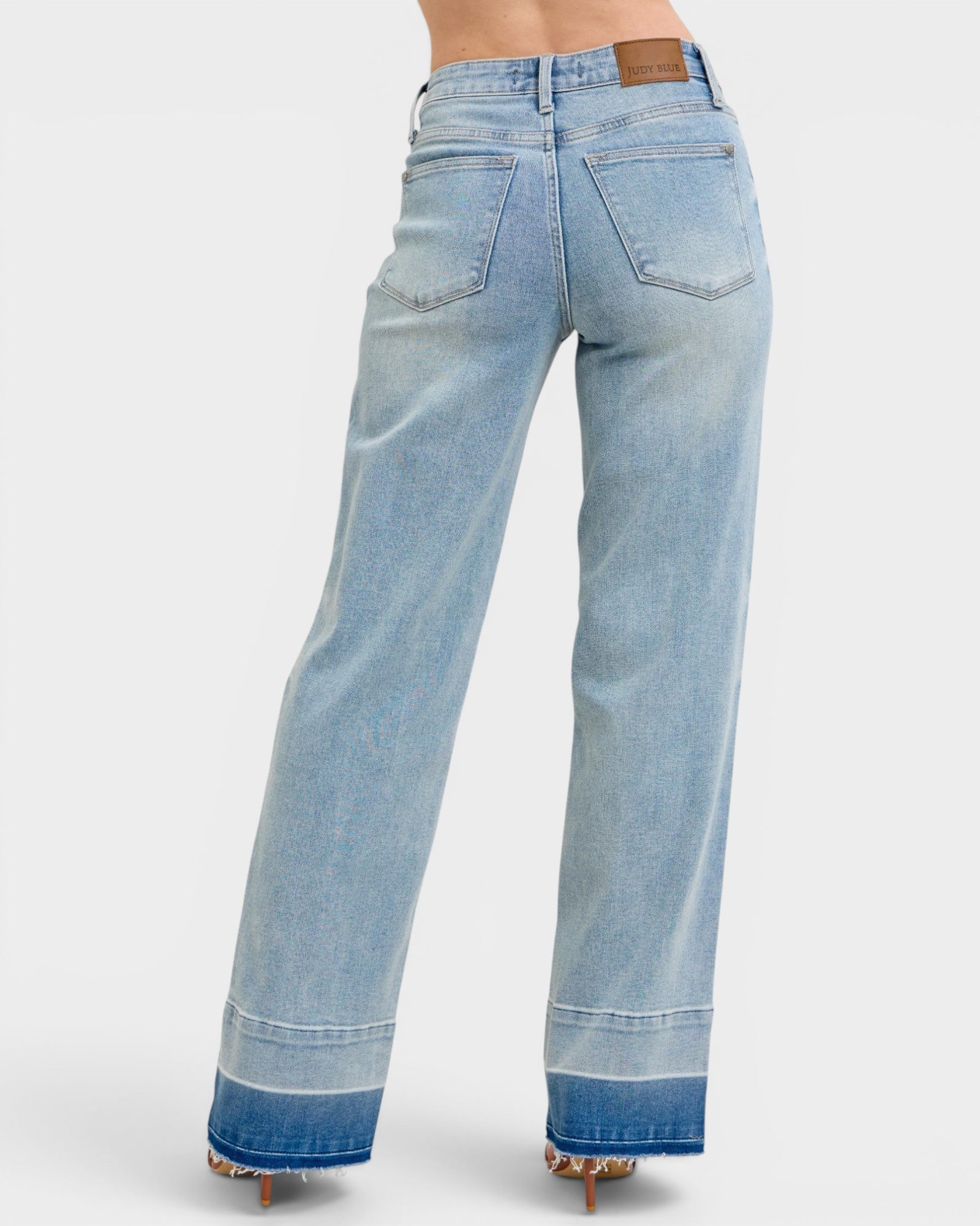Light blue jeans on a white background