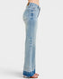 Light blue denim jeans on a white background