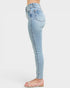Light blue jeans worn by a person on a white background