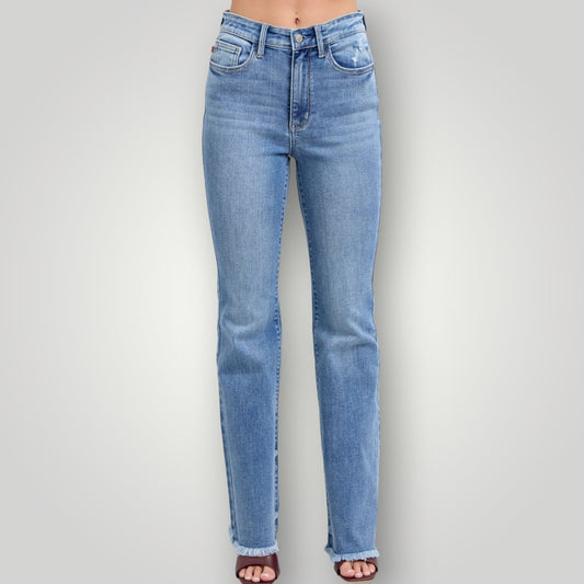 Light blue jeans on a gray background