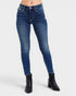Blue jeans worn by a person on a white background