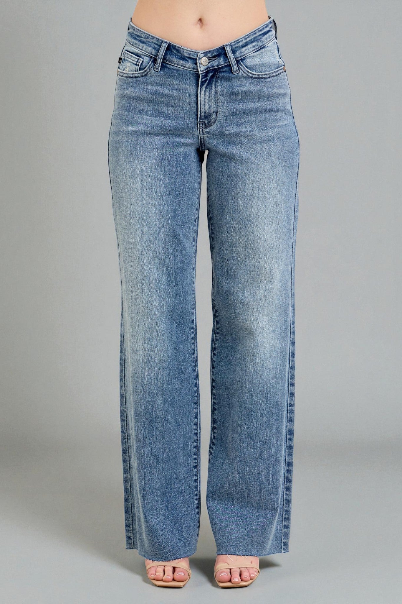 Blue jeans on a gray background