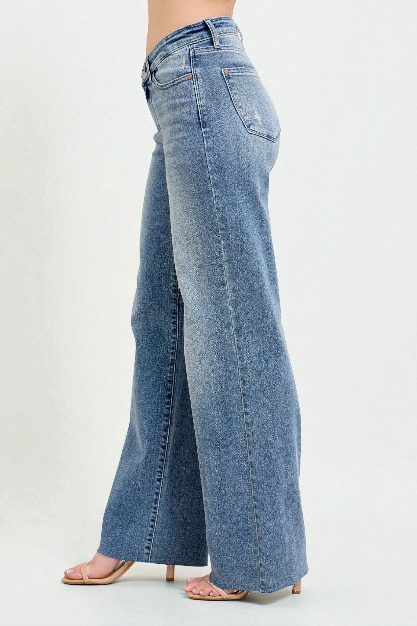 Light blue wide-leg jeans on a white background