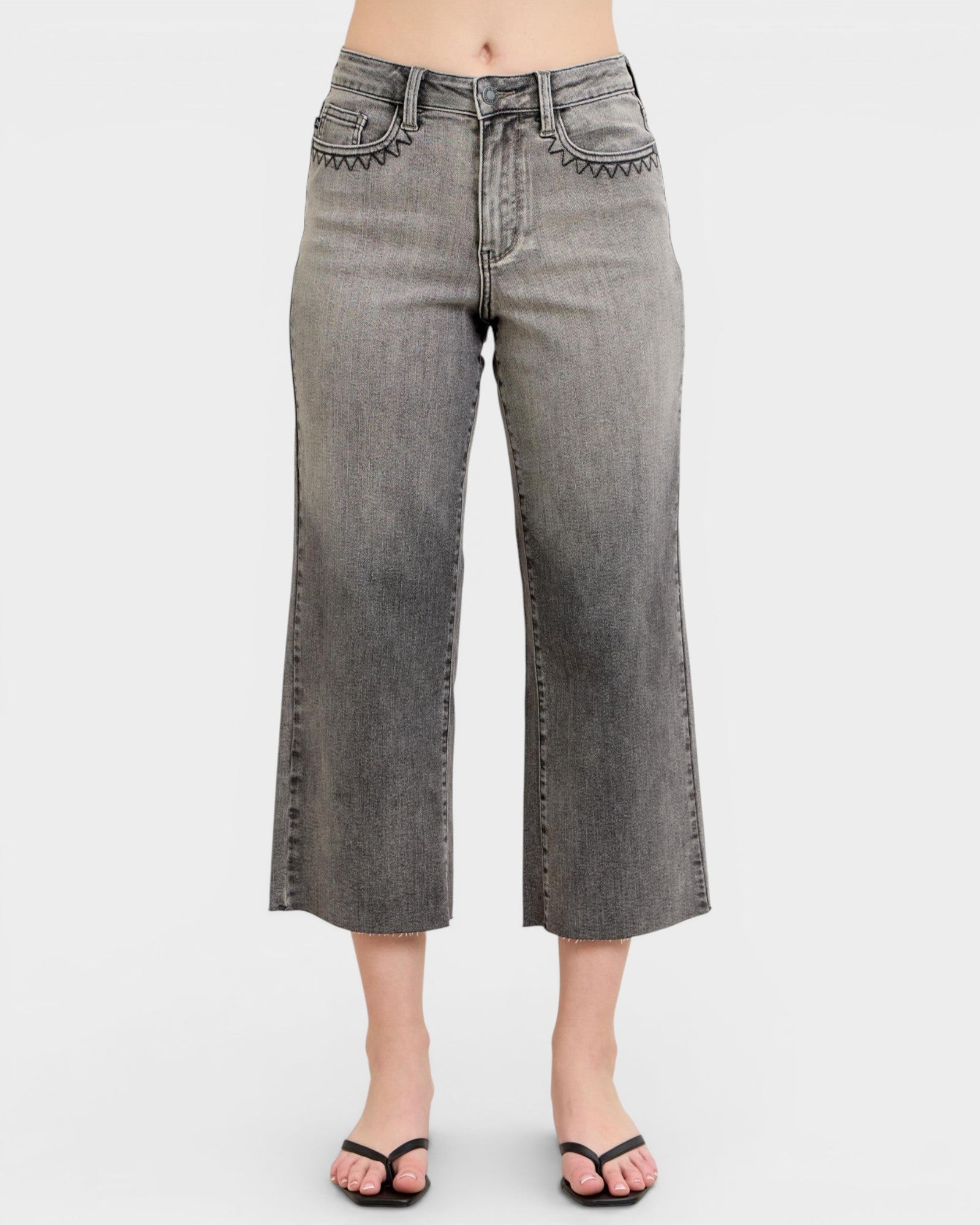 Gray wide-leg jeans on a white background