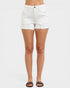 White shorts worn by a person on a white background