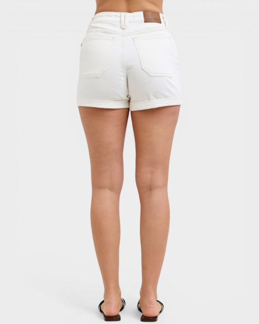 White shorts worn by a person on a white background