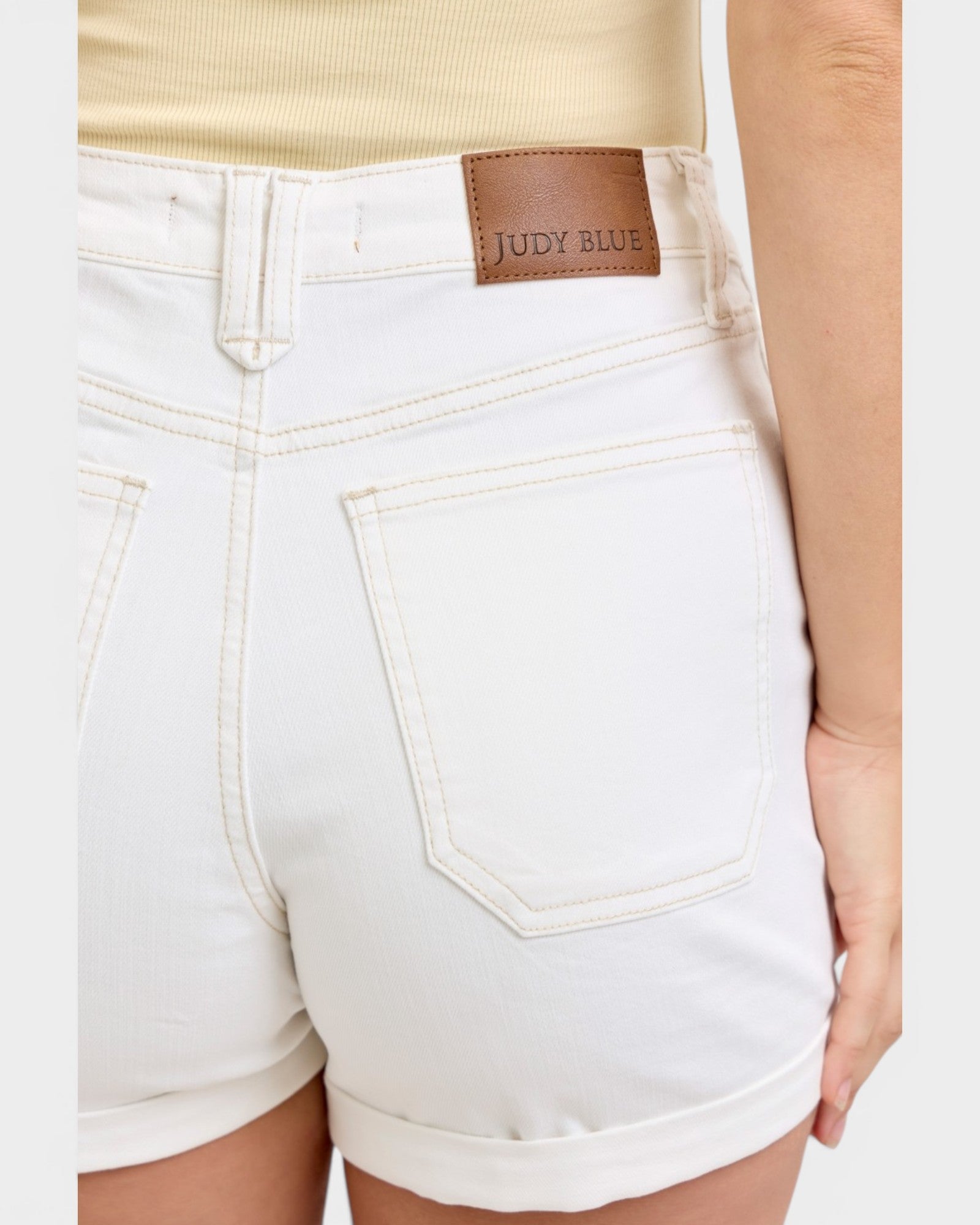 White shorts with a Judy Blue label on a white background
