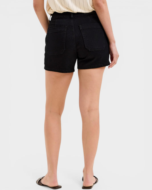 Person wearing black shorts on a white background