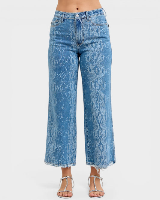 Blue acid-wash jeans on a white background