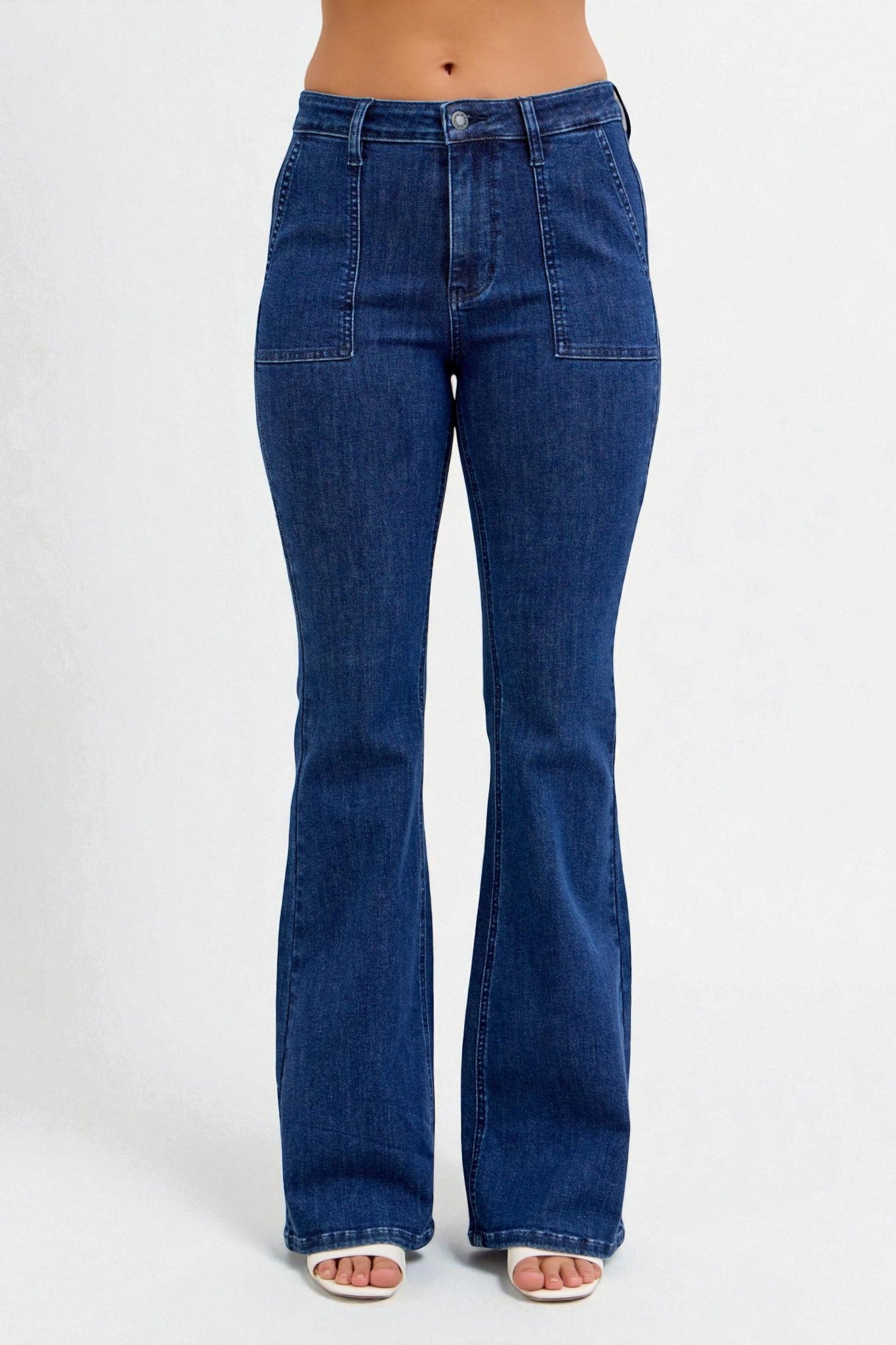 Blue flared jeans on a white background