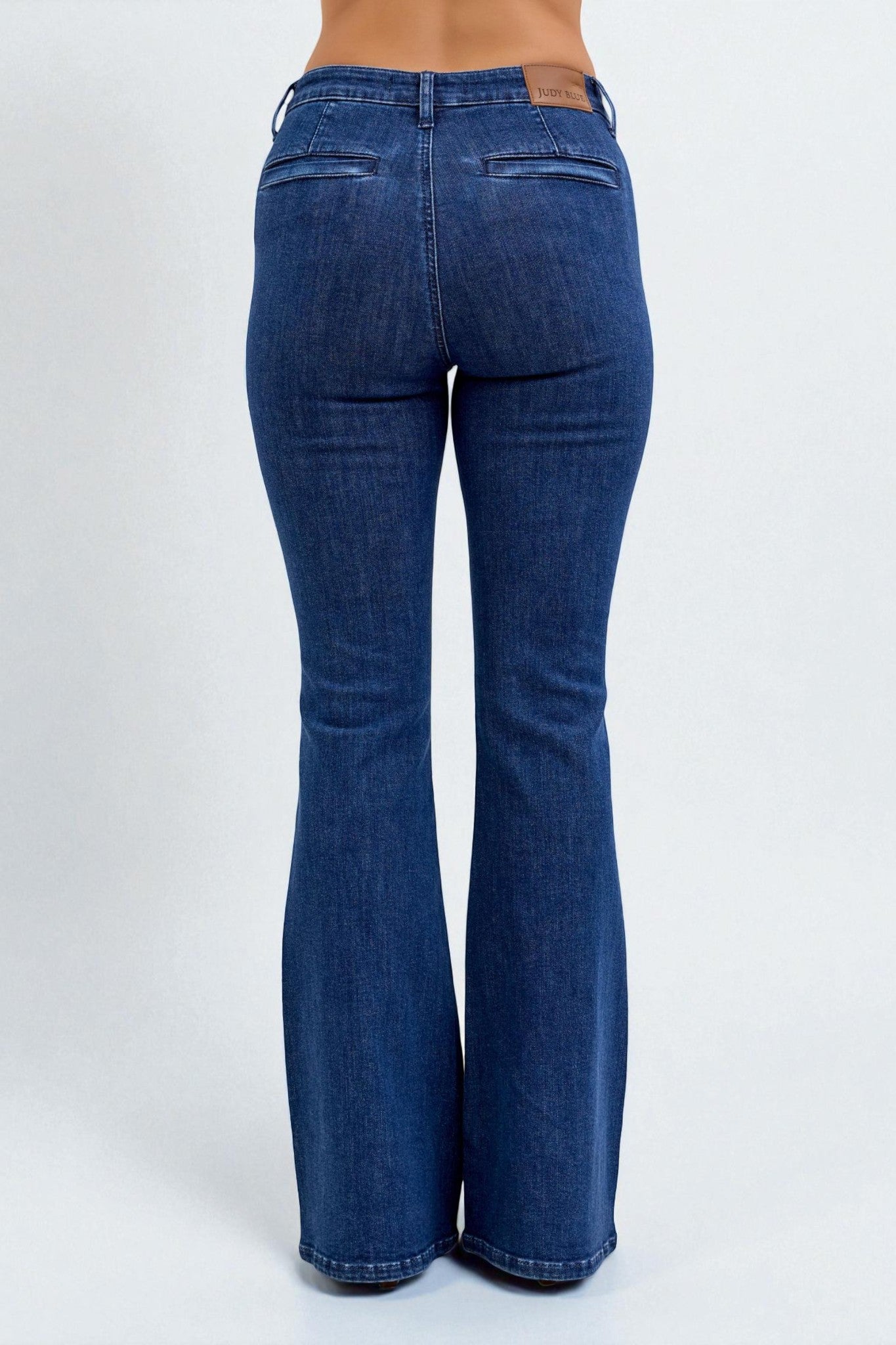 Blue jeans with a white background