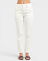 White pants worn by a person on a white background