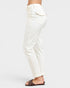 White pants worn by a person on a white background