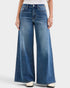 Wide-leg jeans worn by a person on a white background