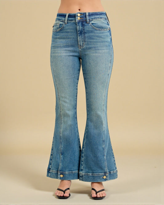 Blue flared jeans on a beige background