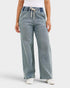 Light blue wide-leg jeans worn by a person on a white background
