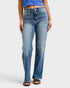 Person wearing blue jeans on a white background
