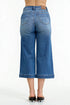 Blue denim wide-leg jeans on a white background