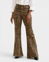 Leopard print flared pants worn by a person on a white background