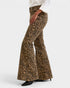 Leopard print pants worn by a person on a white background