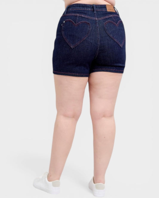 Denim shorts with heart-shaped pockets on a white background