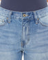Close-up of blue jeans with a focus on the waistband and stitching.