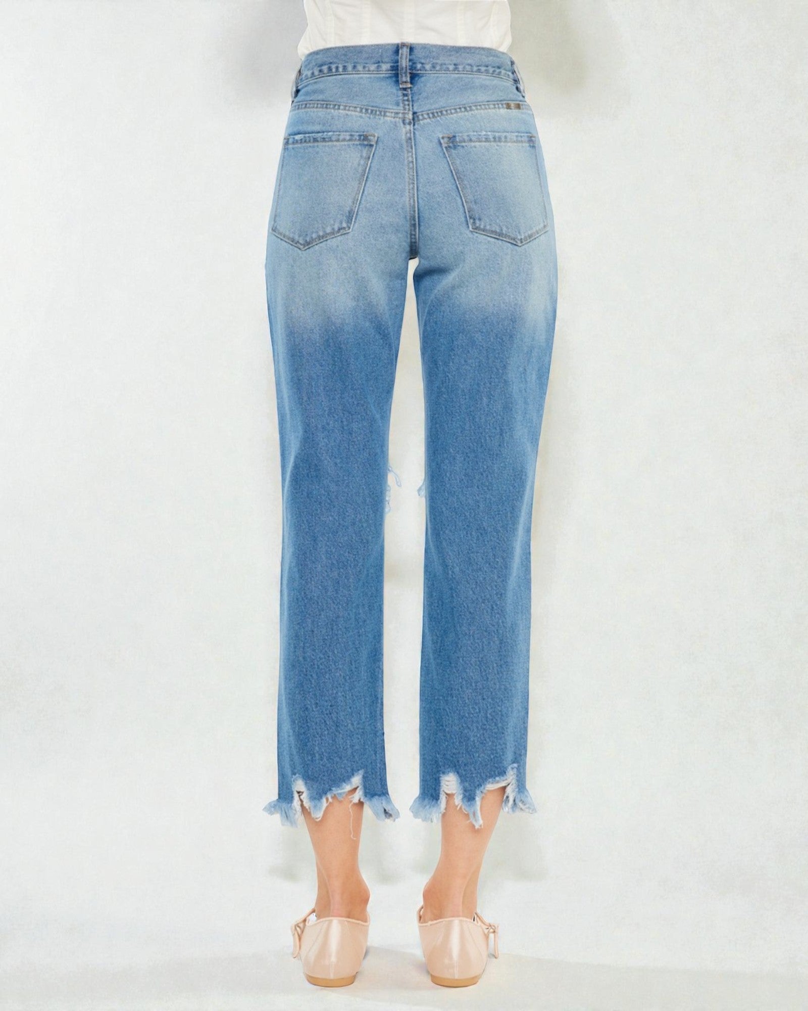 Light blue jeans with a white background