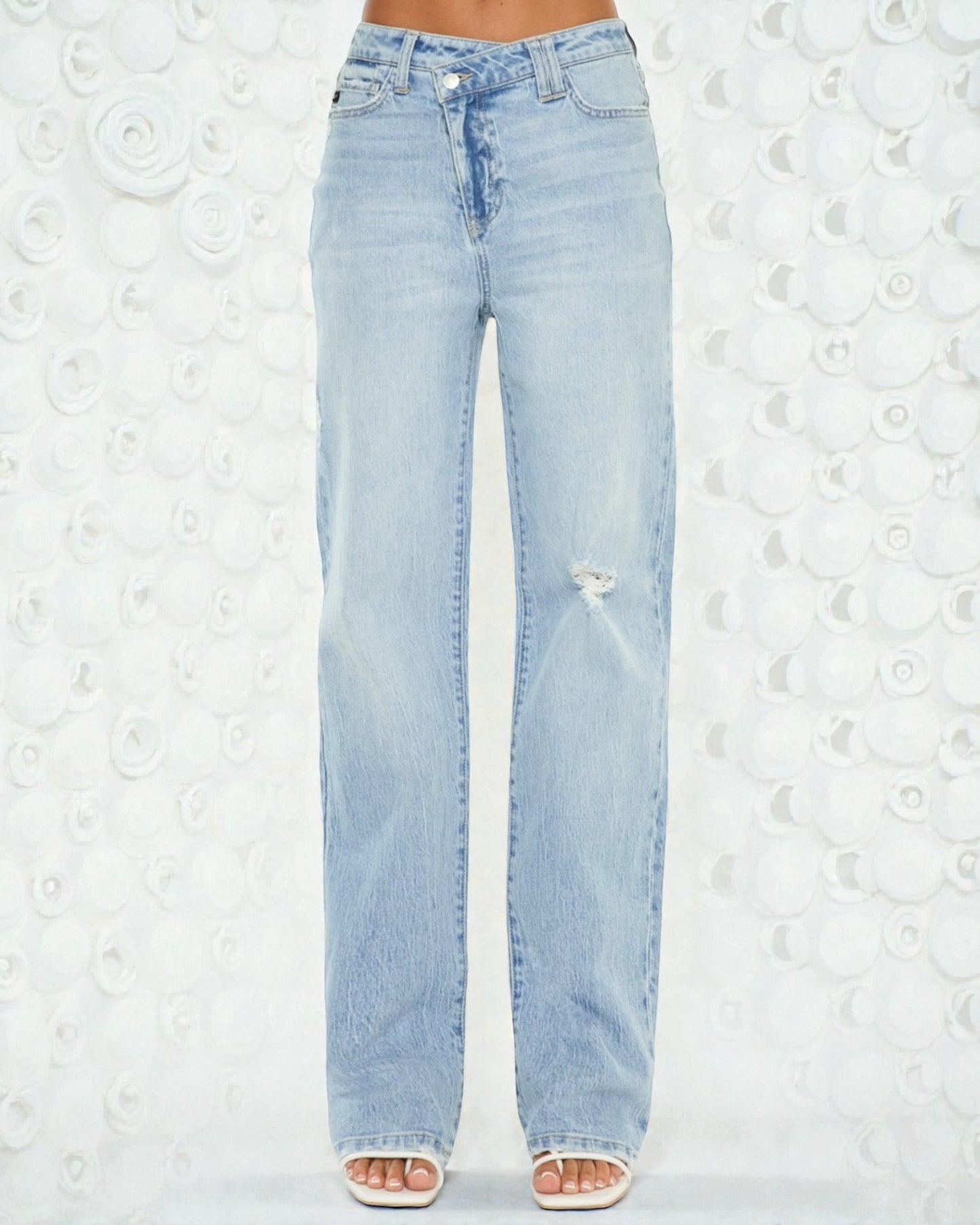 Light blue jeans on a white background