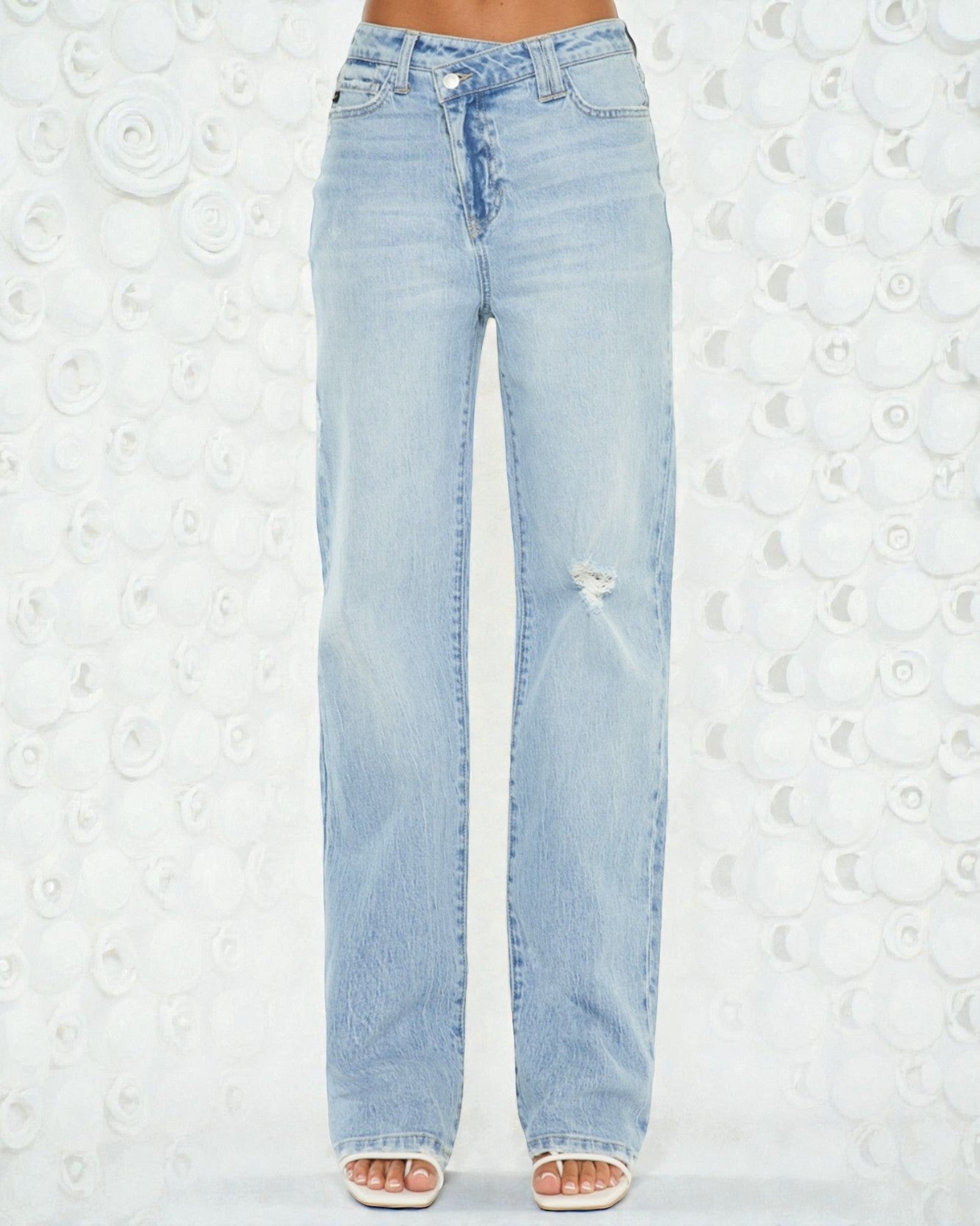 Light blue jeans on a white background