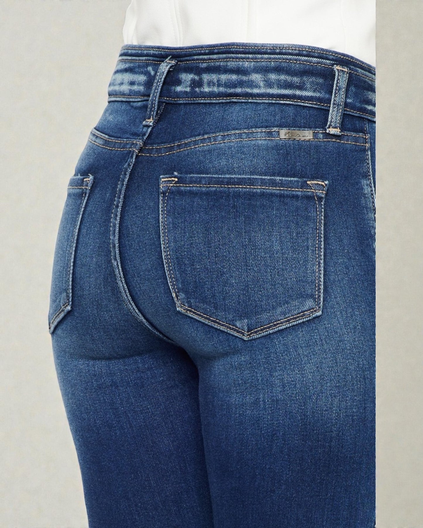 Blue jeans with a plain background