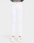 White pants worn by a person on a white background